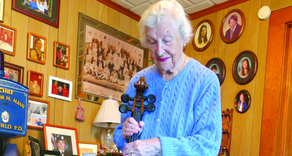 Guarding a family cello, protecting musical roots