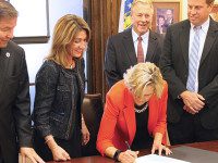 Lt. Gov. Polito signs Needham Community Compact