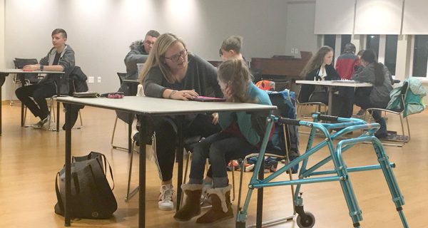 Needham VIPs help one another