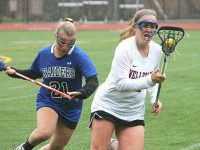 Wellesley, DS girls battle in wet Raider Bowl