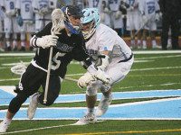 Mastrobuono, Raider lax battle Medfield in rain