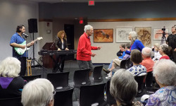 Community relaxes with Summertime Blues concert