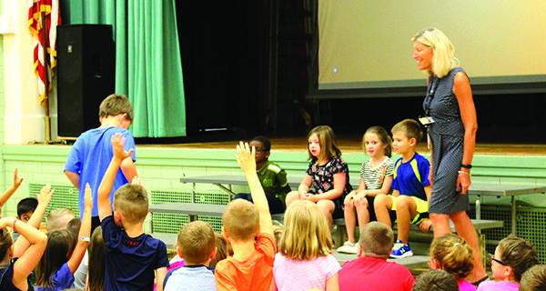 Vacation says goodbye, school waves hello