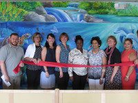 Needham Montessori School cuts ribbon