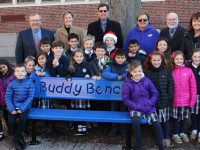 Rotarians install St. Joe’s ‘buddy bench’