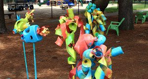 Lea Songin’s installation inspired by Dr. Seuss’s ‘One Fish, Two Fish, Red Fish, Blue Fish’ offers creative ideas on how to recycle plastic containers. Photos by Laura Drinan