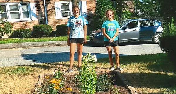 Walpole Scouts build flower garden