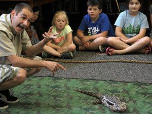 Animal exhibitor Corey Kummel explains where each of the animals comes from. Photos by Daniel Curtin