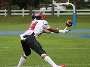Princeton-committed receiver Alex Cherry (84) hauls in one of his six receptions on the afternoon.