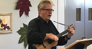 Ukulele class instructor Daniel Metraux leads the group during its weekly session.