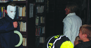 Families walked closely together, not knowing what lay beyond the next book shelf. 