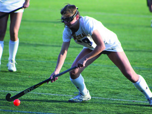 Lexi Schmalz (19), who netted the game-winner in overtime for Needham, moves the ball up the field.  Photos by Michael Flanagan