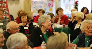 Westwood Spanish Teacher Eileen Flanagan directs the choruses in Spanish.