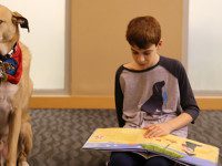 Needham’s kids read to Tucker