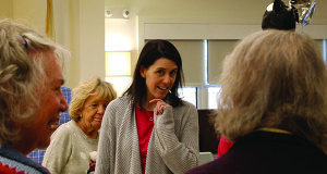 COA Director Kerri McManama converses with the crowd.