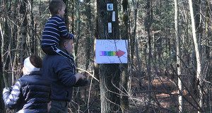 A young hiker hitches a ride midway down the trail during Walpole’s annual New Year’s Day Hike.