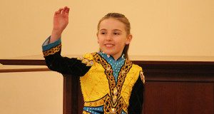 Alice McGowan acknowledges a fan in the crowd.