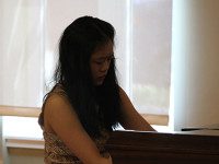 Pianist Adrian Liao performs for seniors