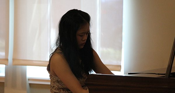 Pianist Adrian Liao performs for seniors