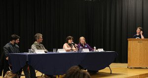 7th grader Colin Levine moderates the panel discussion.