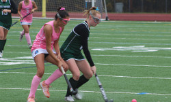 Wolverines outlast Warriors in rain