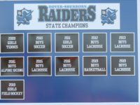 Nora Searle Field adds title plaques