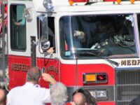 Town salutes Hughes for firefighting service