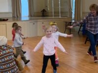 Sherborn children sing and swing