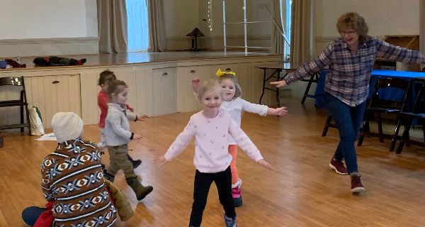 Sherborn children sing and swing