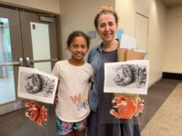 Locals enjoy reverse painting