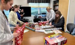 Intergenerational gift wrapping at the COA