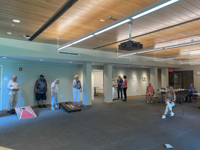 Summer cornhole celebration at the COA