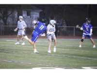 Boys’ lax fights hard versus Medfield